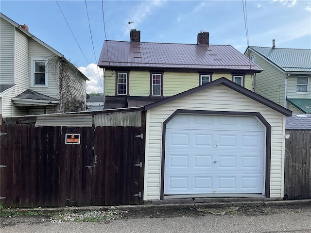 garage with fence