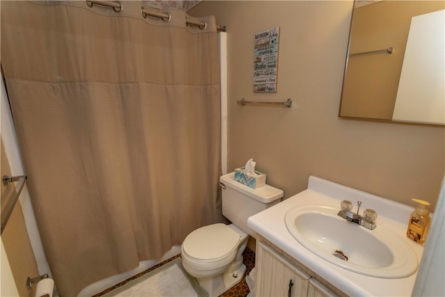 bathroom featuring tile patterned flooring, vanity, toilet, and a shower with shower curtain