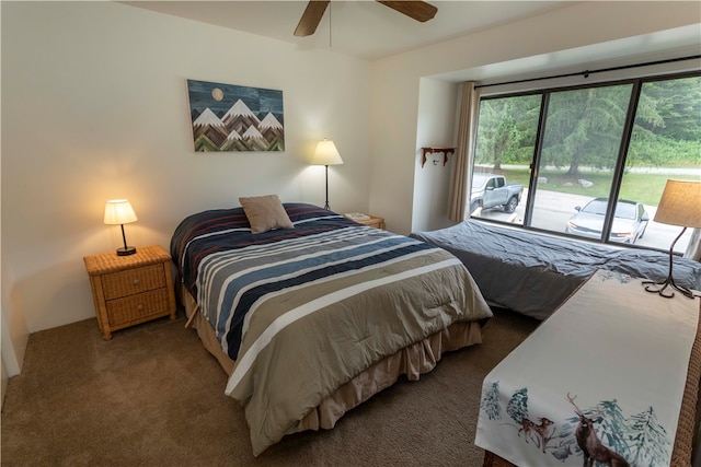 carpeted bedroom with access to outside and ceiling fan