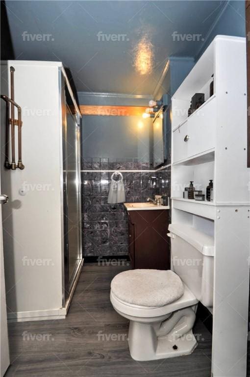 bathroom with toilet and walk in shower