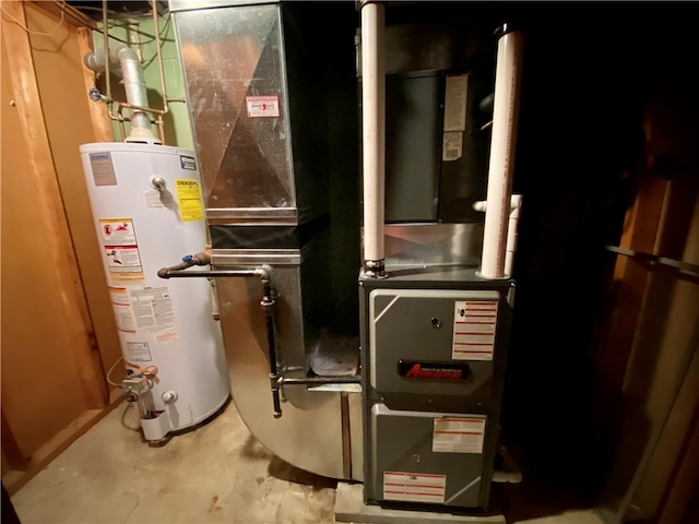 utility room with gas water heater