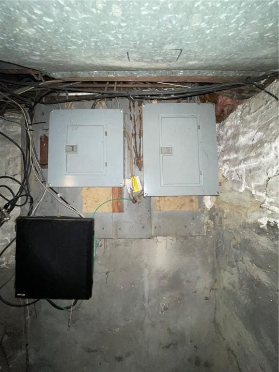 basement featuring electric panel