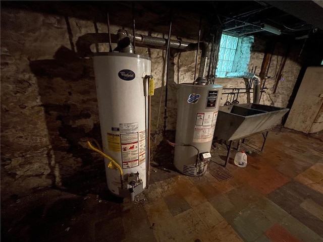 utility room featuring water heater