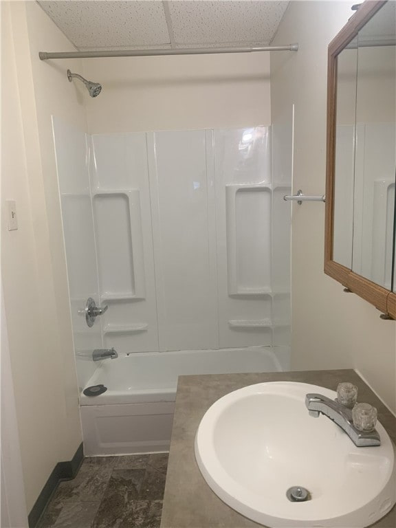 bathroom with sink and shower / bathing tub combination