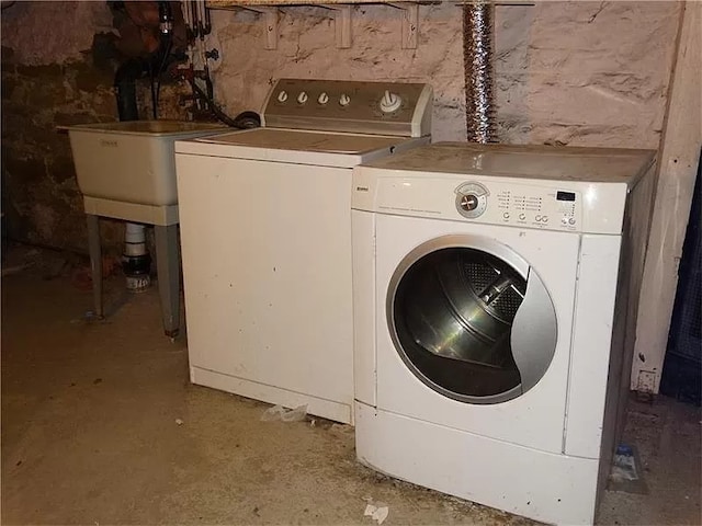 laundry room with washer and dryer