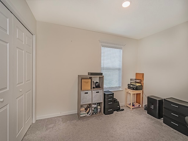 misc room with light colored carpet