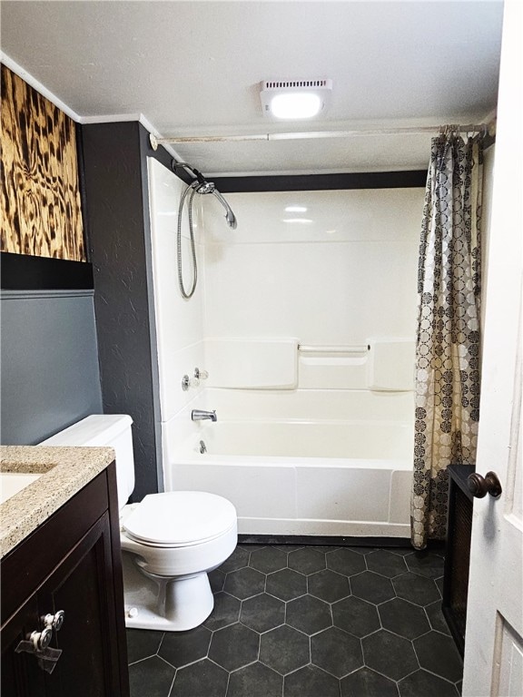 full bathroom featuring vanity, shower / tub combo with curtain, toilet, and tile patterned floors