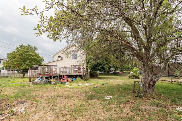 view of yard featuring a wooden deck