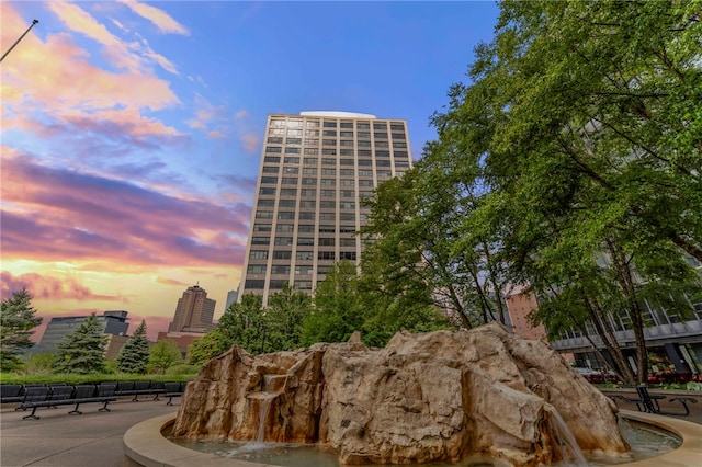 view of outdoor building at dusk