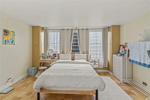 bedroom featuring light parquet floors