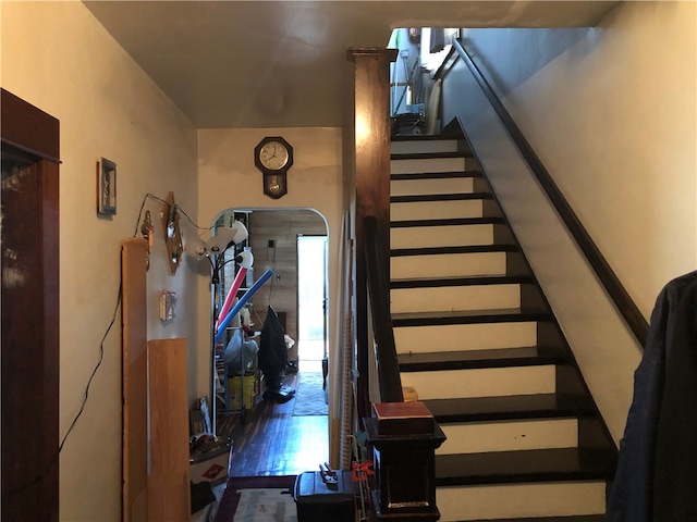 stairway with wood-type flooring