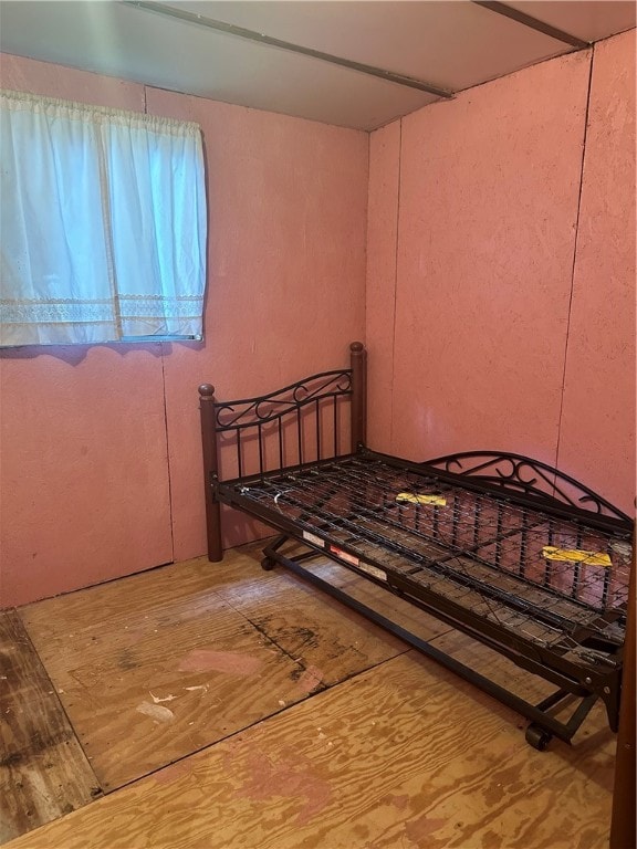 bedroom featuring hardwood / wood-style flooring