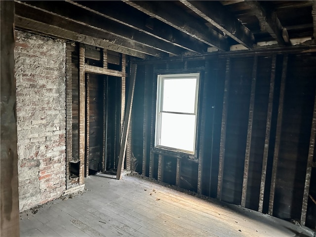 miscellaneous room with wood-type flooring