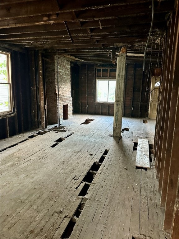 misc room featuring a healthy amount of sunlight and hardwood / wood-style floors