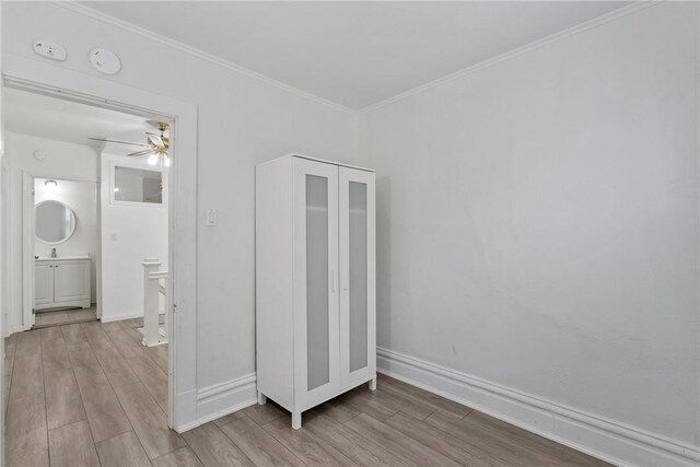 interior space with ceiling fan and hardwood / wood-style flooring