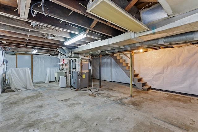 basement featuring heating unit