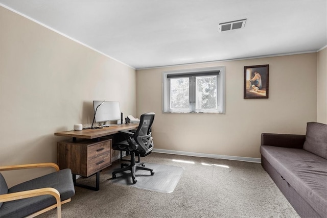 carpeted office with crown molding