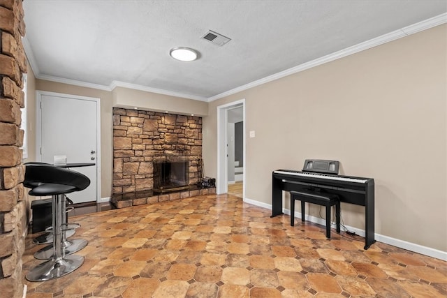 living room with a stone fireplace, crown molding, and a textured ceiling