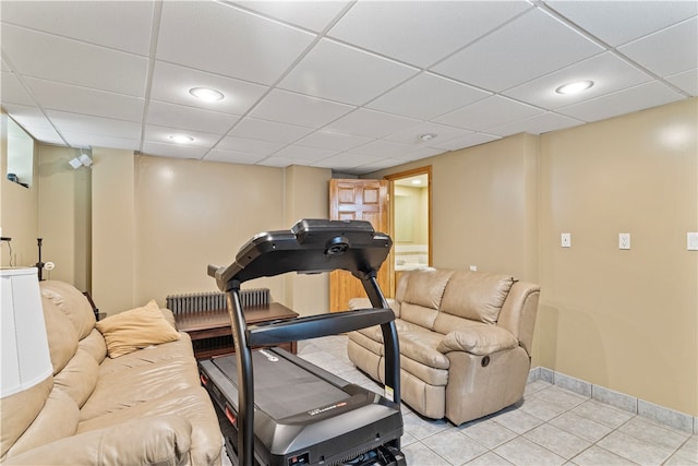 exercise area featuring a drop ceiling