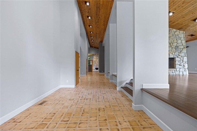 hall featuring wooden ceiling