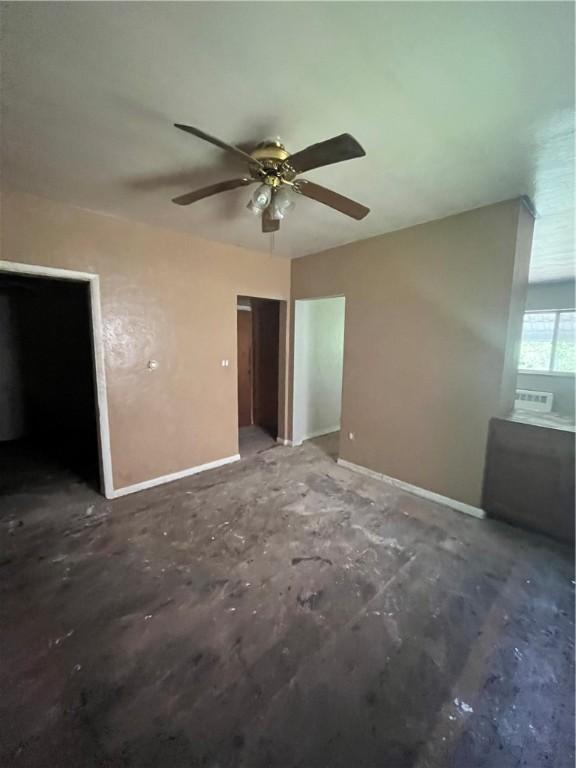 unfurnished bedroom with ceiling fan