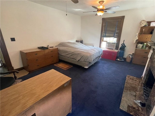 bedroom with carpet floors, a ceiling fan, and cooling unit