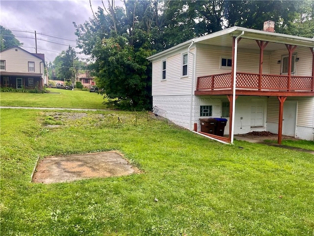 view of yard with a deck