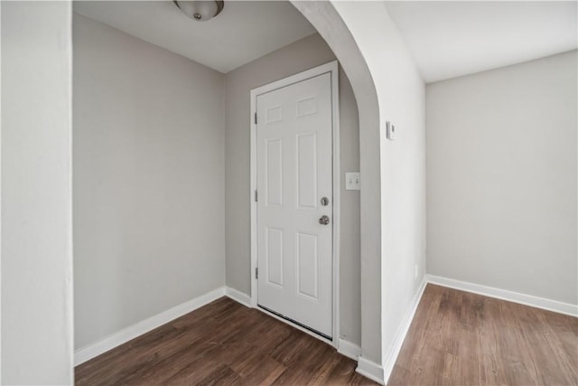 interior space with dark hardwood / wood-style flooring