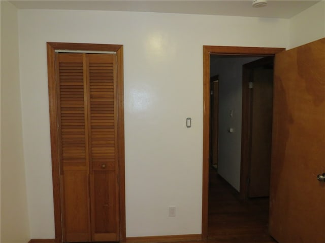 hall featuring dark hardwood / wood-style floors