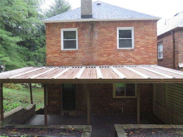 rear view of house with a patio area