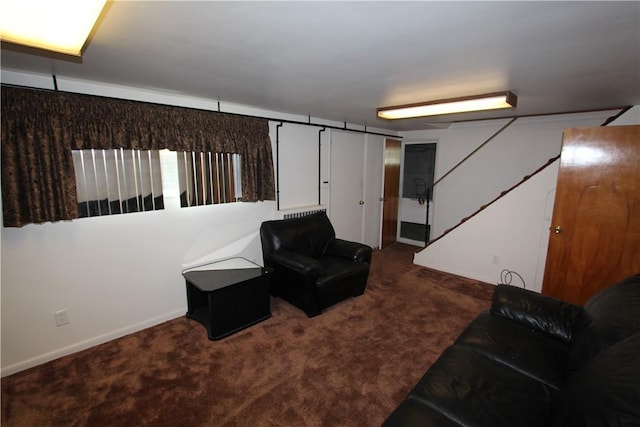 interior space featuring dark colored carpet