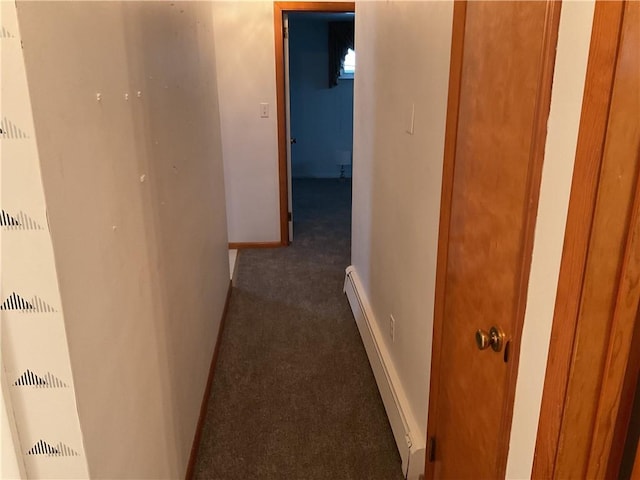 hall featuring baseboard heating and dark colored carpet