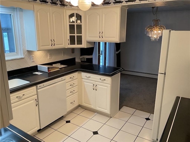 kitchen with white appliances, a notable chandelier, white cabinetry, decorative light fixtures, and a baseboard radiator