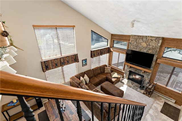 M1 Sunridge Rd, Seven Springs Resort, PA 15622 - living area featuring a fireplace and lofted ceiling