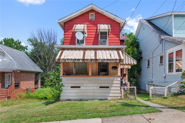 view of front facade featuring central AC unit and a front yard