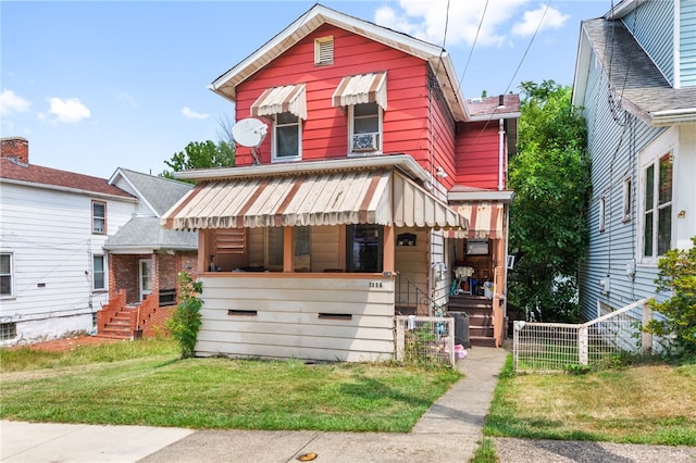 view of front facade with a front yard