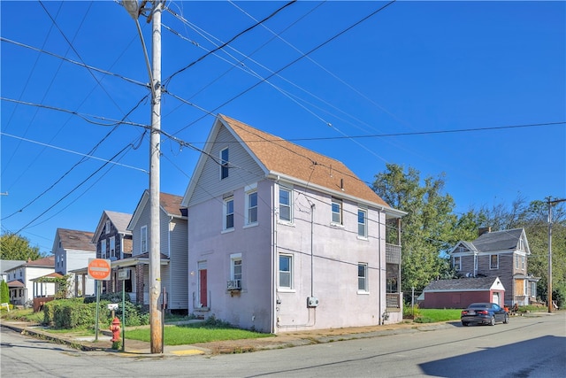 view of side of home with cooling unit