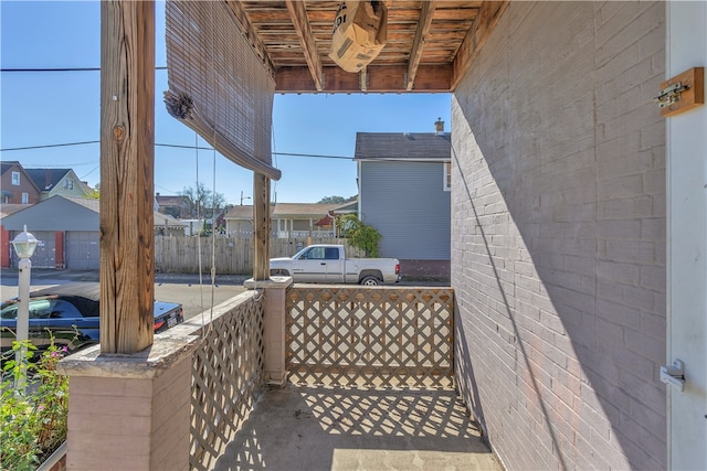 view of patio featuring a garage and an outdoor structure