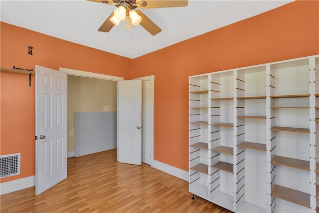 unfurnished bedroom featuring light hardwood / wood-style flooring and ceiling fan