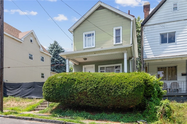 view of front of property featuring covered porch