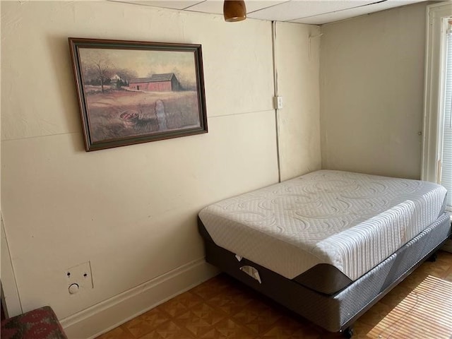 bedroom with parquet flooring