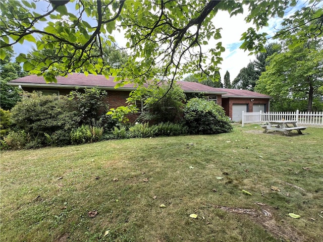 view of yard with a garage