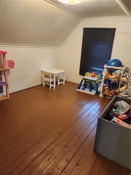 rec room featuring lofted ceiling and hardwood / wood-style floors