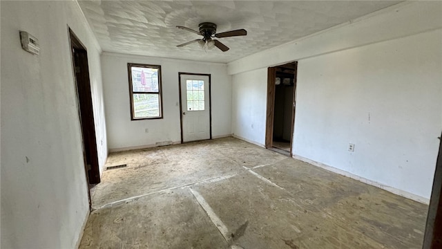 unfurnished bedroom featuring ceiling fan