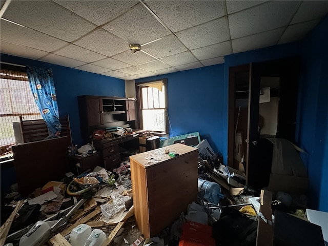 misc room with a paneled ceiling