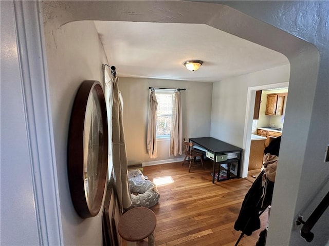 living area with wood-type flooring