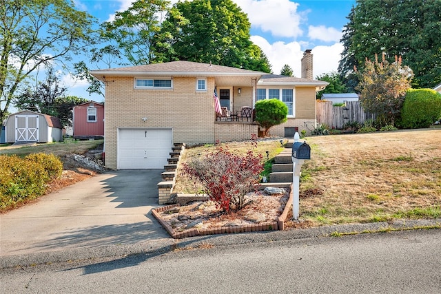 view of front of home featuring a garage and a storage unit