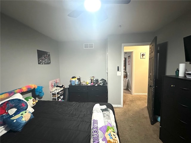 carpeted bedroom with ceiling fan