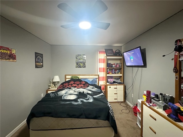 bedroom with light colored carpet and ceiling fan