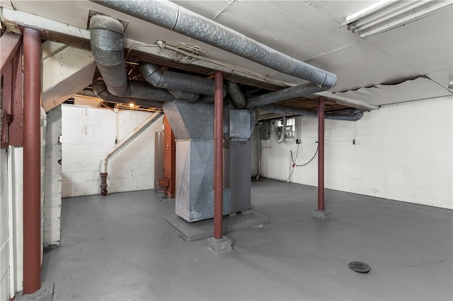 basement featuring heating unit